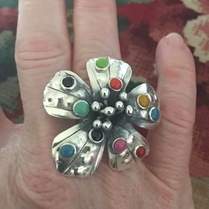 Very unique sterling silver/jewel flower ring.